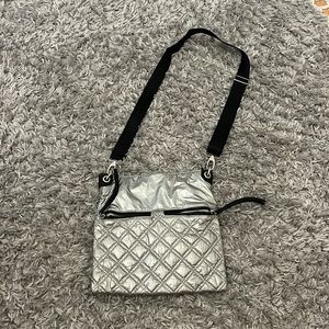 Sondra Roberts Squared silver quilted crossbody bag. Great for travel